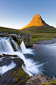 Kirkjufell Mountain and Kirkjufoss Waterfall at sunset, Snaefellsnes Peninsula, Iceland, Polar Regions