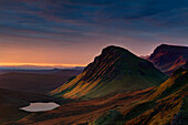 First light of a new morning strikes The Cleat on the Trotternish peninsula, Isle of Skye, Inner Hebrides, Scotland, United Kingdom, Europe