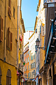 Narrow street in the Old Town, Vieille Ville, Nice, Alpes-Maritimes, Cote d'Azur, Provence, French Riviera, France, Mediterranean, Europe