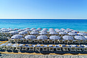 Blue and white beach parasols, Nice, Alpes-Maritimes, Cote d'Azur, Provence, French Riviera, France, Mediterranean, Europe