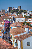 City overview with Medieval Castle in the background, Obidos, Portugal, Europe