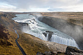 Landscape with Gullfoss waterfall, steam and road, Hrunamannahreppur, Arnessysla, Sudurland, Iceland, Europe