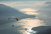 Paragliding over Lake Como and the surroundings mountains, Alto Lario, Como, Lombardy, Italy, Europe