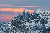 Europe, Italy, Veneto, Belluno, Winter sunset from Col Margherita, In the background the edge of mount Agner in evidence, Dolomites