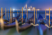 Europe, Italy, Veneto, Venice, Night landscape towards the island of San Giorgio with the gondolas