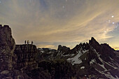 Photographers in action near the Three Peaks of Lavaredo at night, Sesto Dolomites Trentino Alto Adige Italy Europe