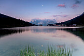 The Sorapiss mountain range is reflected in Lake Antorno at sunrise, Veneto Sesto Dolomites Italy Europe