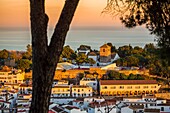 White village of Mijas at sunset. Malaga province Costa del Sol. Andalusia Southern Spain, Europe.