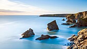 A view towards Bedruthan Steps in north Cornish coast between Padstow and Newquay, Cornwall, England, United Kingdom, Europe.