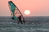 Tarifa, Costa de la Luz, Cadiz, Andalusia, Spain. Windsurfing at sunset.