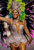 Brazil, State of Rio de Janeiro, City of Rio de Janeiro, Samba Dancer in the Carnival Parade.