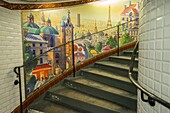 Abbesses, painted mural and spiral staircase, Station Abbesses, Paris, France