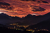 Lorenzago di Cadore, Belluno, Dolomites, Veneto, Italy, Colored sunset over Lorenzago di Cadore and Centro Cadore