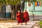 Amarapura, Mandalay region, Myanmar, Monk walking in the Mahagandayon monastery