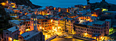 Vernazza, Cinque Terre, La Spezia, Liguria, Italy, Panoramic view of the village at dusk