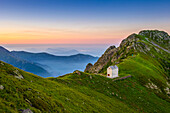 Val Grande, Piedmont, Italy, Landscape with mountain hut at sunrise