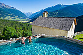 Bagni Vecchi, Bormio, Valtellina, Lombardy, Italy, Thermal wellness center with open vista with the alpine landscape