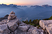 Europe, Italy, Veneto, Belluno, Sunrise from the First Pala di San Lucano summit towards Agordo, Agordino, Dolomites