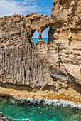 Riaci, Calabria, Italy, Window in the cliffs on the beach at Riaci