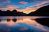 Grosina valley, reflection sunrise at Malghera lake, Lombardy, Italy