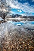 Ice covering the surface of Lake Sils Engadine, Switzerland Europe