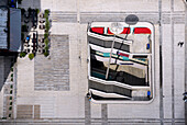 France, Paris 14th district, aerial and graphic view of a terrace at the foot of the Montparnasse Tower. Street lamp and stairs on the right-hand side. Restaurant tables and chairs on the left-hand side