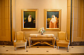 United Arab Emirates, Abu Dhabi, painting portraits of sheiks at the Emirates Palace hotel.