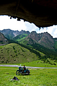 Kyrgyzstan, Issyk Kul Province (Ysyk-Kol), Juuku valley, view from Assil and Gengibek's yurt, their children on a bike