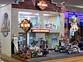 France, Normandy. Manche. Coutances. Miniatures exhibition. Close-up on a miniature representing aHarley Davidson garage.