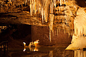 France, Lot, Cave of Lacave, Underground lake and stalactite ceiling