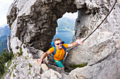 Hiker at Naturfreundesteig, hiking trail at Mount Traunstein, Upper Austria, Austria, Europe