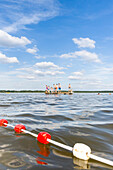 Kids swimming, beach, playing in the water, near campsite Havelberge, lake Woblitzsee, holiday, summer, swimming, sport, Mecklenburg lakes, Mecklenburg lake district, Granzow, Mecklenburg-West Pomerania, Germany, Europe