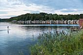 Boat houses at lake Schweriner Innensee, stand up paddling, SUP, Schwerin, Mecklenburg-West Pomerania, Germany, Europe