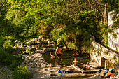 People bathing in a hot spring, Balneario, thermal bath, basin, Alhama de Granada, Granada province, Andalucia, Spain, Europe