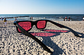 giant sunglasses at the beach, Baltic Sea, Zingst, Mecklenburg-West Pomerania, Germany
