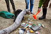 Flattening Beer Cans From A Day Of Rafting On The Yampa River