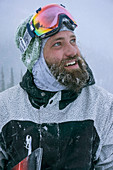 Portrait Of A Snowboarder Mark Hoyt After Landing A Trick In The Backcountry