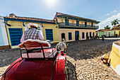 A horse-drawn cart known locally as a coche in Plaza Mayor, Trinidad, UNESCO World Heritage Site, Cuba, West Indies, Caribbean, Central America