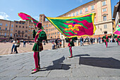 Typical exhibition of traditional clothes and flags of the different contradas, Piazza del Campo, Siena, UNESCO World Heritage Site, Tuscany, Italy, Europe