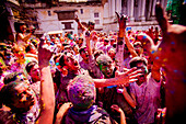 Crowd throwing pigment at the Holi Festival, Durbar Square, Kathmandu, Nepal, Asia