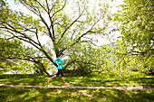 A Woman Running Along The Esplanade Near Charles River In Boston