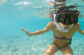 Underwater View Of A Girl Doing Snorkeling Using Snorkeling Mask In Cuba