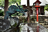 Dragon Fountain In Temple At Irumw-shi, Japan