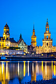 Illuminated Historic Buildings Along The Elbe River At Night
