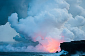 A Volcanic Eruption Over The Ocean With Lots Of Billowing Smoke