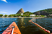 Kayaking inside Guanabara Bay near the Sugar Loaf mountain, Rio de Janeiro, Brazil