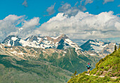 Women And Child Hiking On The Highline Trail In Glacier National Park, Montana, Usa