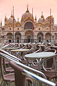 Europe, Italy, Veneto, Venice,  Rows of chairs and tables at the outdoor cafe in St,  Mark square