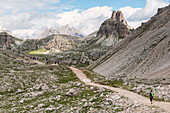Hikers venturing to discover the Locatelli refuge, Sesto Dolomites Trentino Alto Adige Italy Europe