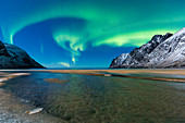 Northern lights in the night sky over Ersfjord Beach, Ersfjord, Ersfjorden, Senja, Norway, Europe